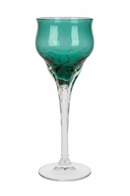 Close up Vintage Empoli-style emerald green tulip cordial glass with clear stem
