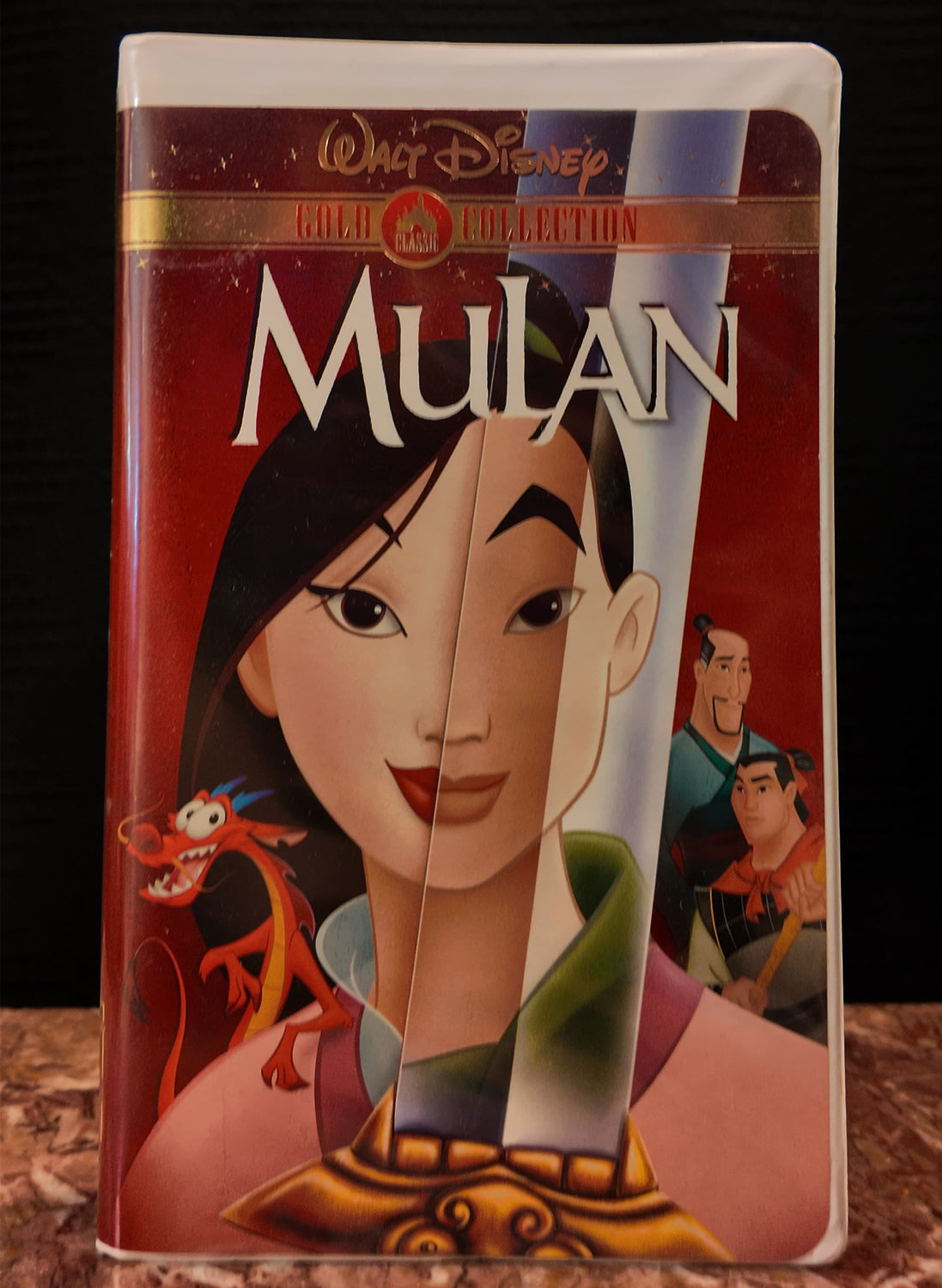 VHS tape cover of 'Mulan' with Disney logo